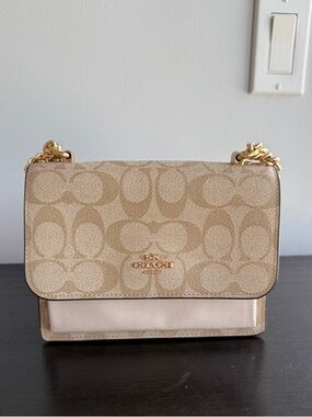 Coach Mini Klare Crossbody bag in signature canvas w/ a chalk white block